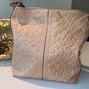 Vintage signature leather coach hobo bag in beige